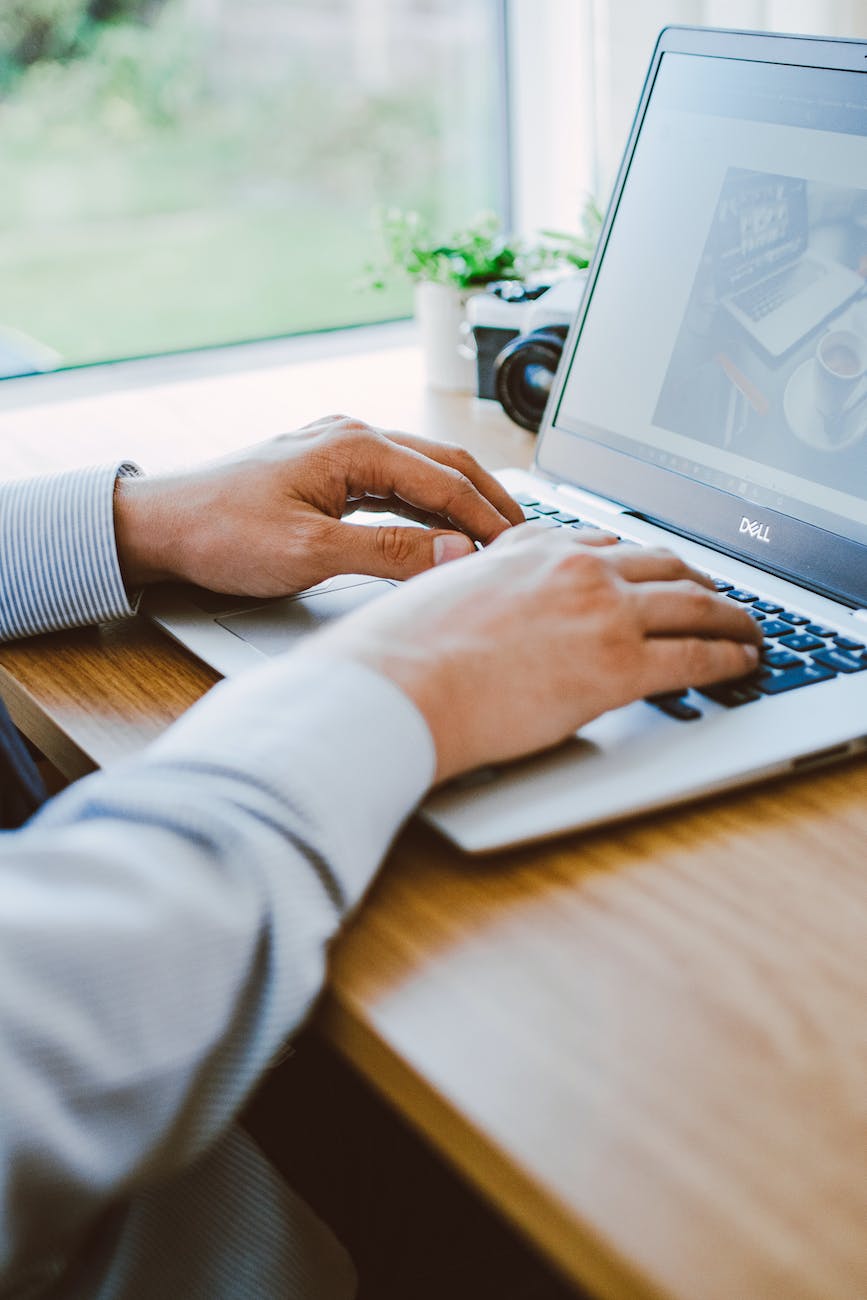 man using dell laptop