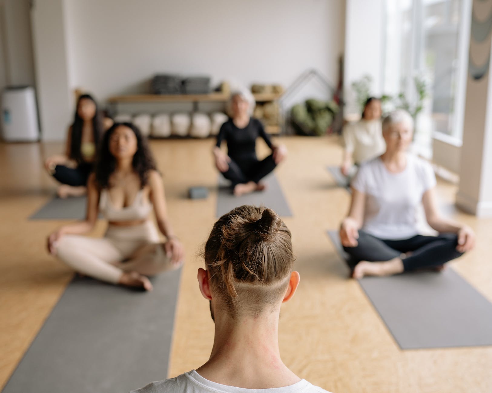 people at a yoga class